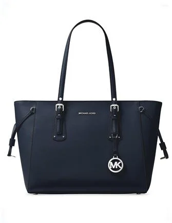 Edgy Bags For Bold And Daring Fashionistas Michael Michael Kors Voyager Multi Function Top Zip Medium Tote